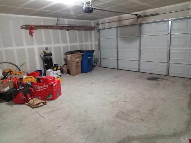 11540 Arbroath Ln, Austin, TX 78754 - garage featuring a garage door opener
