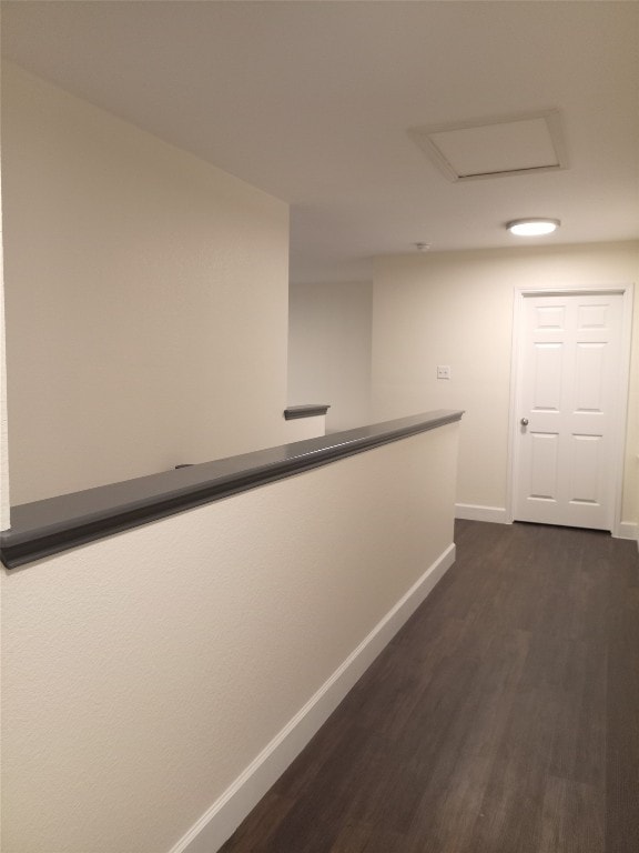 11540 Arbroath Ln, Austin, TX 78754 - hall featuring dark wood finished floors and attic access