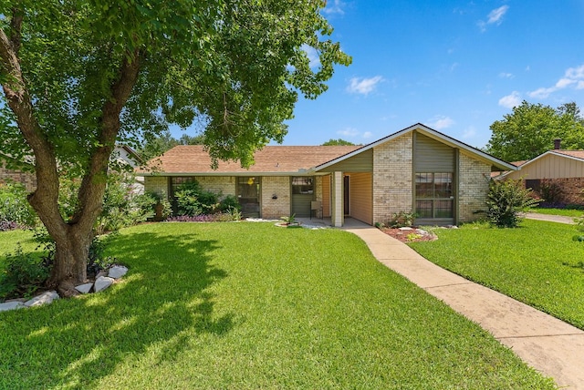 2014 Stagecoach Trl, Temple, TX 76502 - view of front of home featuring brick siding and a front lawn
