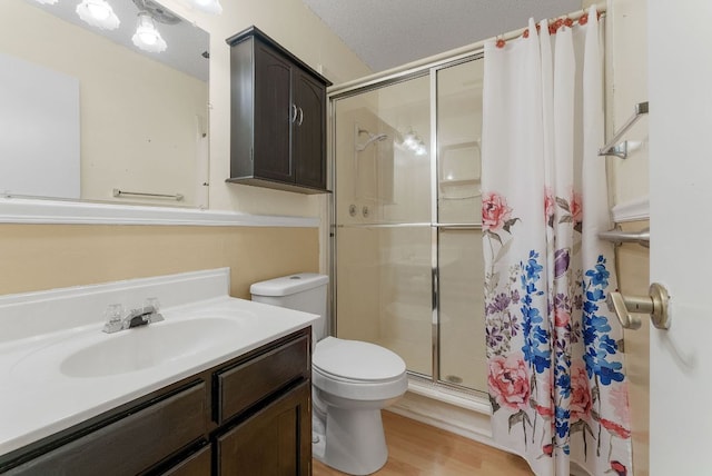 2014 Stagecoach Trl, Temple, TX 76502 - full bath with a shower stall, vanity, and wood finished floors