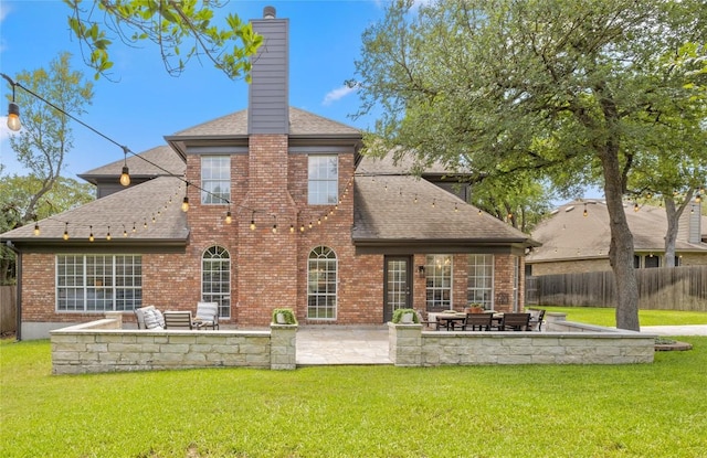 11235 Tracton Ln, Austin, TX 78739 - rear view of house featuring a shingled roof, a chimney, a fenced backyard, and a patio