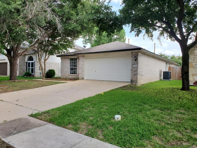 707 Johnny Bench, Round Rock, TX 78665 - view of front of home featuring a garage, concrete driveway, and brick siding