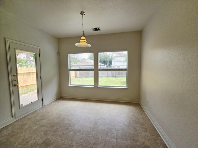 707 Johnny Bench, Round Rock, TX 78665 - spare room featuring baseboards