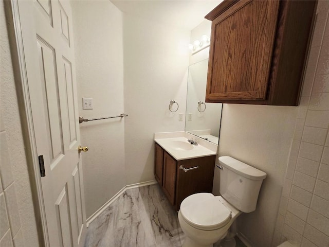 707 Johnny Bench, Round Rock, TX 78665 - bathroom featuring vanity and marble look tiles