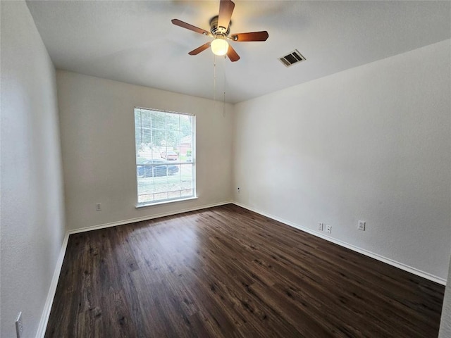 707 Johnny Bench, Round Rock, TX 78665 - spare room featuring dark wood-type flooring and a ceiling fan