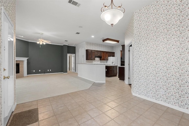 403 Warm Breeze Cv, Austin, TX 78717 - unfurnished living room with wallpapered walls, ceiling fan, a fireplace, and recessed lighting