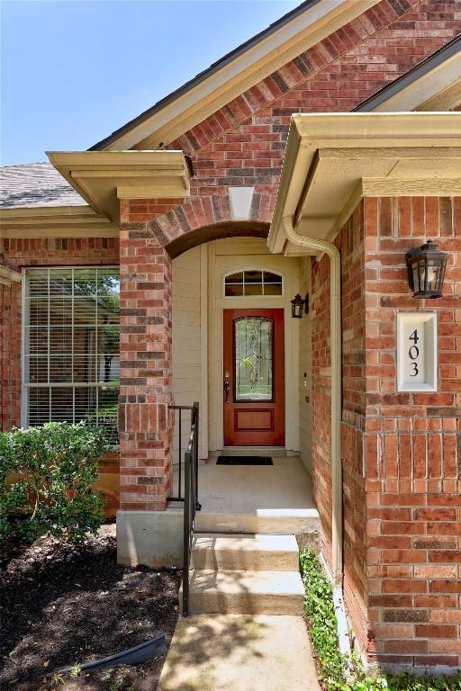 403 Warm Breeze Cv, Austin, TX 78717 - entrance to property with brick siding