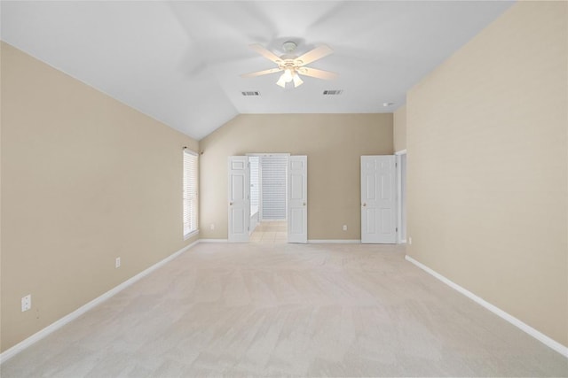 403 Warm Breeze Cv, Austin, TX 78717 - empty room featuring a ceiling fan, light colored carpet, and high vaulted ceiling