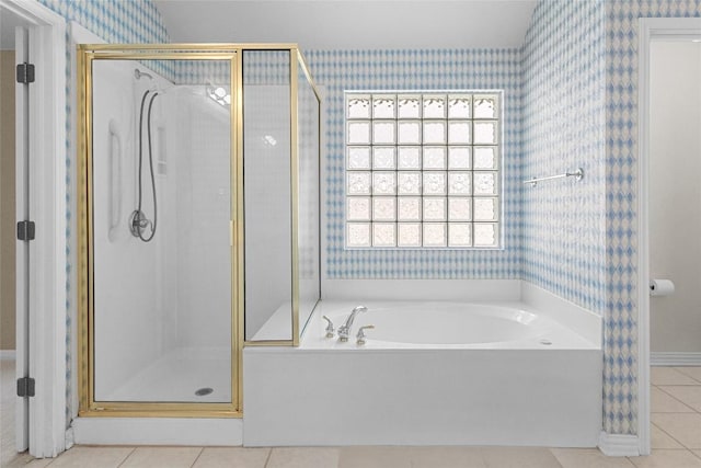 403 Warm Breeze Cv, Austin, TX 78717 - bathroom with wallpapered walls, a stall shower, a garden tub, and tile patterned floors