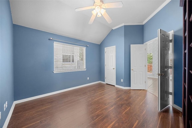 403 Warm Breeze Cv, Austin, TX 78717 - unfurnished bedroom featuring vaulted ceiling, wood finished floors, ceiling fan, and crown molding