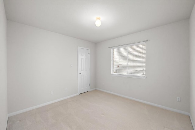 403 Warm Breeze Cv, Austin, TX 78717 - spare room featuring light carpet and baseboards