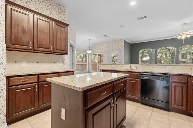 403 Warm Breeze Cv, Austin, TX 78717 - kitchen featuring dishwasher, light tile patterned floors, a kitchen island, backsplash, and plenty of natural light
