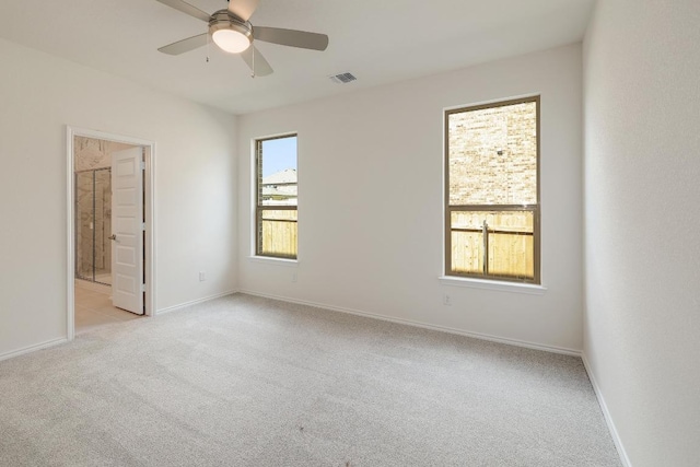 4935 Mozzafiato Ln, Round Rock, TX 78665 - spare room featuring light carpet and a ceiling fan