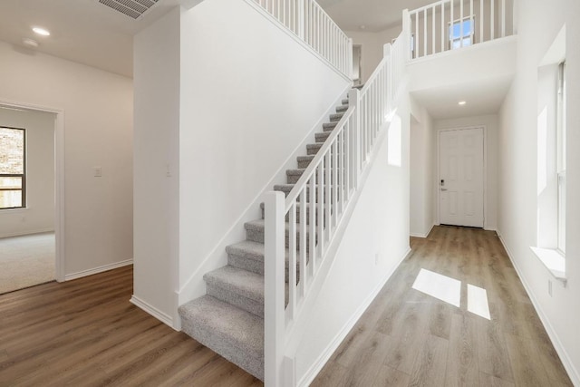 4935 Mozzafiato Ln, Round Rock, TX 78665 - stairs featuring wood finished floors and recessed lighting