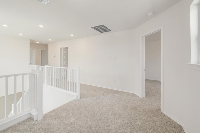 4935 Mozzafiato Ln, Round Rock, TX 78665 - spare room featuring carpet flooring, recessed lighting, and a smoke detector