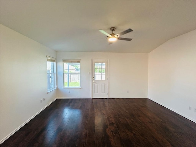 600 Mccarthur Dr, Leander, TX 78641 - empty room featuring a ceiling fan, dark wood finished floors, and lofted ceiling