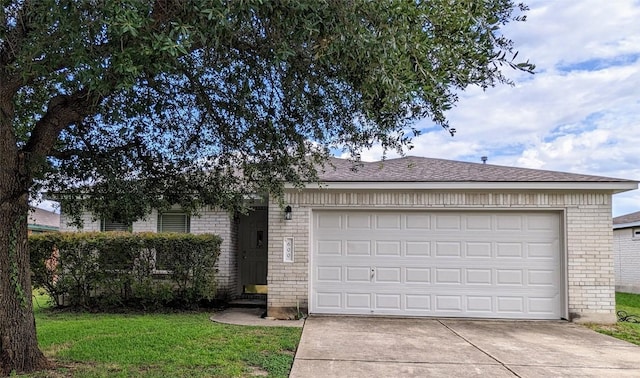 600 Mccarthur Dr, Leander, TX 78641 - ranch-style house featuring brick siding, driveway, a front yard, and an attached garage