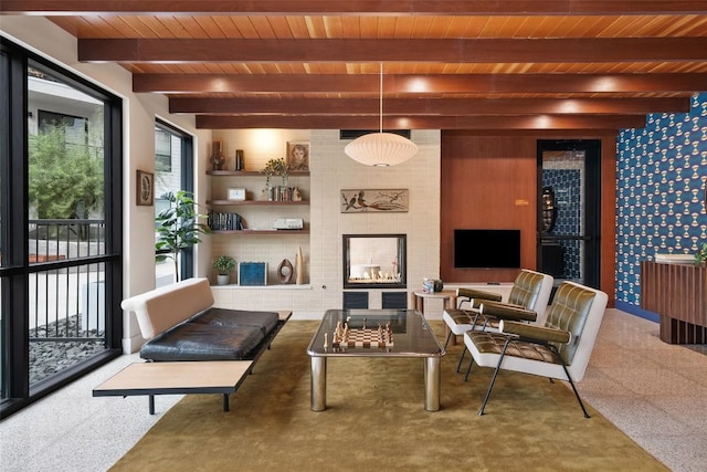 1701 Simond Ave Unit 305, Austin, TX 78723 - carpeted living area with a wood ceiling with exposed beams