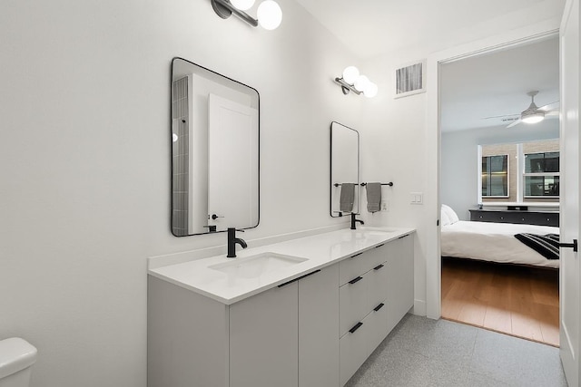 1701 Simond Ave Unit 305, Austin, TX 78723 - ensuite bathroom featuring double vanity and ceiling fan