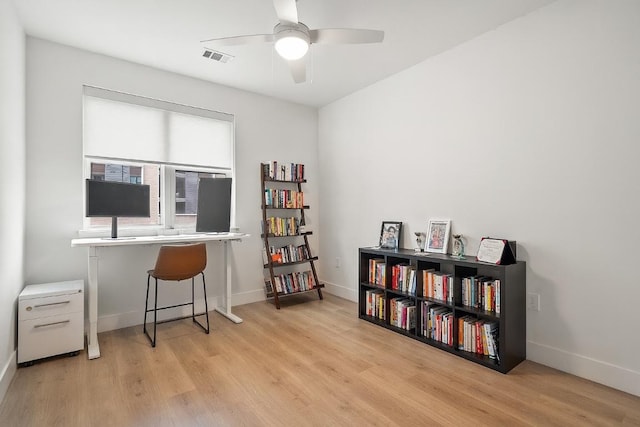 1701 Simond Ave Unit 305, Austin, TX 78723 - office space featuring light wood-style flooring and a ceiling fan