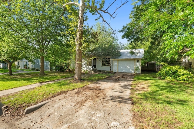 2613 Geraghty Ave, Austin, TX 78757 - obstructed view of property featuring concrete driveway and a garage