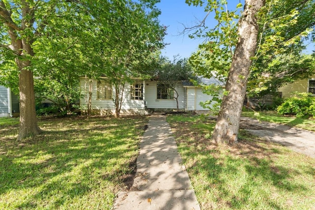2613 Geraghty Ave, Austin, TX 78757 - view of property hidden behind natural elements with a front yard