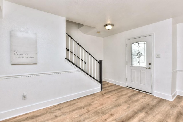 1401 Balsam Way, Round Rock, TX 78665 - foyer entrance featuring wood finished floors and stairway