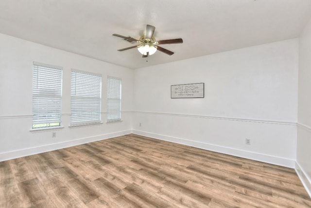 1401 Balsam Way, Round Rock, TX 78665 - spare room with a ceiling fan and wood finished floors