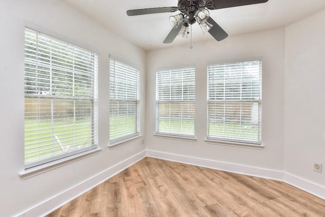 1401 Balsam Way, Round Rock, TX 78665 - unfurnished room with light wood-type flooring, healthy amount of natural light, and a ceiling fan