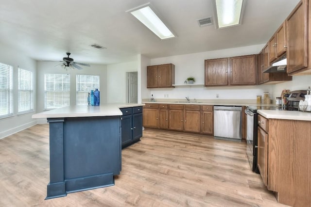 1401 Balsam Way, Round Rock, TX 78665 - kitchen featuring stainless steel dishwasher, electric range, open shelves, under cabinet range hood, and light wood finished floors