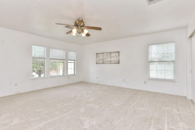 1401 Balsam Way, Round Rock, TX 78665 - empty room with a ceiling fan and light colored carpet