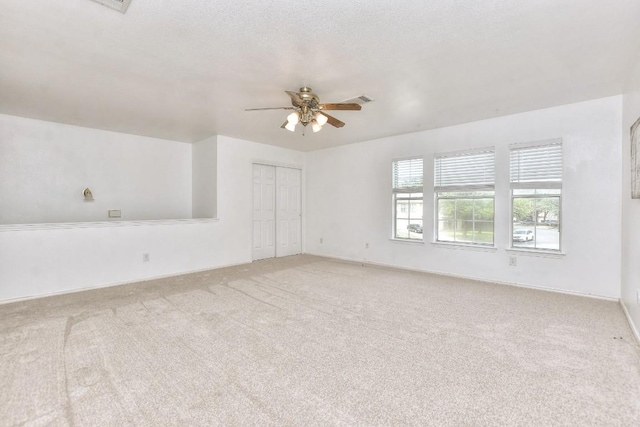 1401 Balsam Way, Round Rock, TX 78665 - empty room with a ceiling fan and light colored carpet