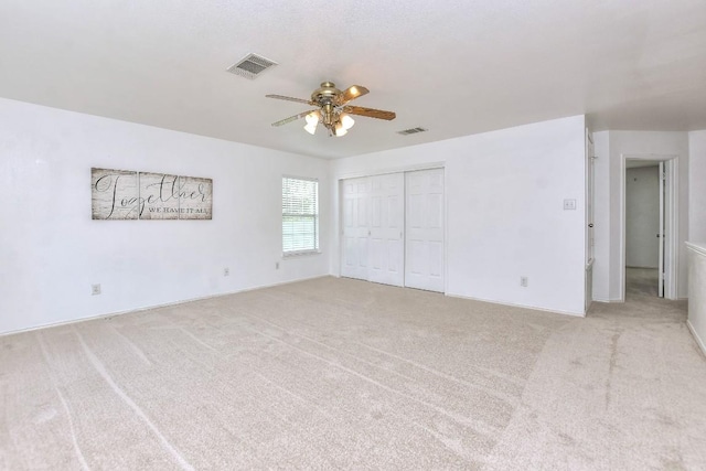 1401 Balsam Way, Round Rock, TX 78665 - unfurnished bedroom featuring carpet flooring, a closet, and ceiling fan