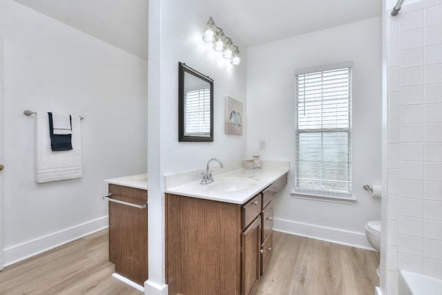 1401 Balsam Way, Round Rock, TX 78665 - full bathroom with wood finished floors, vanity, a bath, and a shower