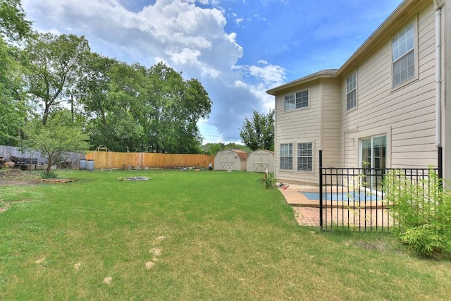 1401 Balsam Way, Round Rock, TX 78665 - fenced backyard with a storage shed and a patio