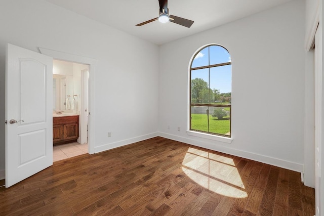 102 Rivulet Ln, Austin, TX 78738 - unfurnished bedroom with wood finished floors and ensuite bath