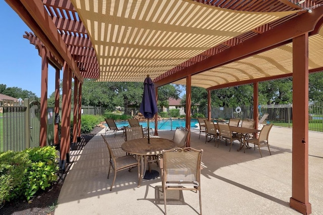 102 Rivulet Ln, Austin, TX 78738 - fenced backyard with a pergola, a community pool, outdoor dining space, and a patio area