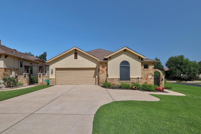 102 Rivulet Ln, Austin, TX 78738 - view of front facade featuring a garage, driveway, stone siding, and a front lawn