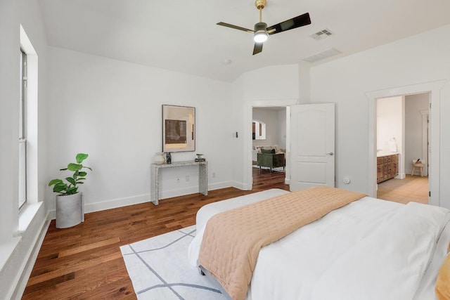 102 Rivulet Ln, Austin, TX 78738 - bedroom featuring wood finished floors, vaulted ceiling, and ceiling fan