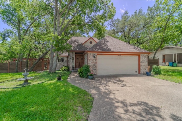 11811 Arabian Trl, Austin, TX 78759 - view of front of house featuring brick siding, driveway, an attached garage, and roof with shingles