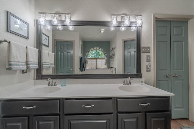 11811 Arabian Trl, Austin, TX 78759 - bathroom with double vanity and tile patterned floors