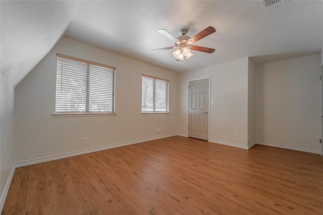 11811 Arabian Trl, Austin, TX 78759 - additional living space with light wood-type flooring, ceiling fan, and lofted ceiling