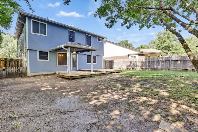 1608 Melibee Trl, Austin, TX 78748 - rear view of house with a wooden deck and a fenced backyard