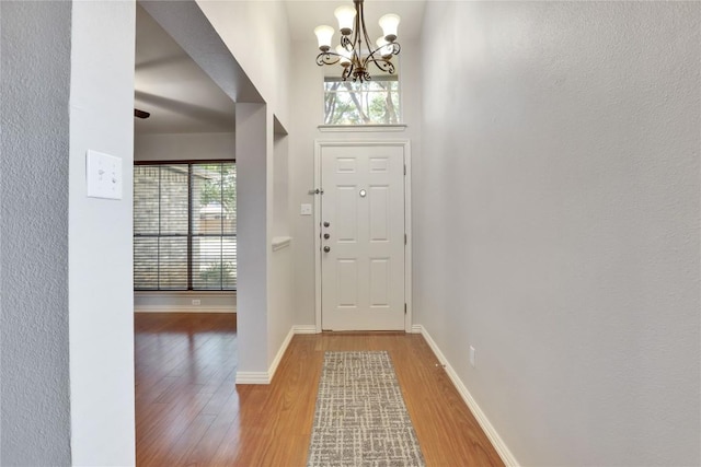 1608 Melibee Trl, Austin, TX 78748 - entrance foyer featuring a chandelier and wood finished floors