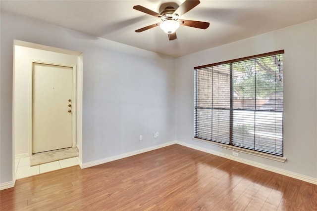 1608 Melibee Trl, Austin, TX 78748 - empty room with wood finished floors and a ceiling fan