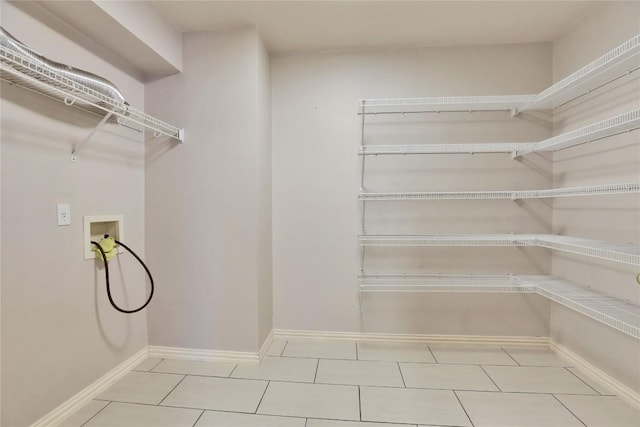 1608 Melibee Trl, Austin, TX 78748 - laundry room featuring hookup for a washing machine and light tile patterned flooring