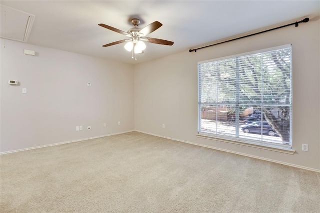 1608 Melibee Trl, Austin, TX 78748 - spare room featuring attic access, light carpet, and a ceiling fan