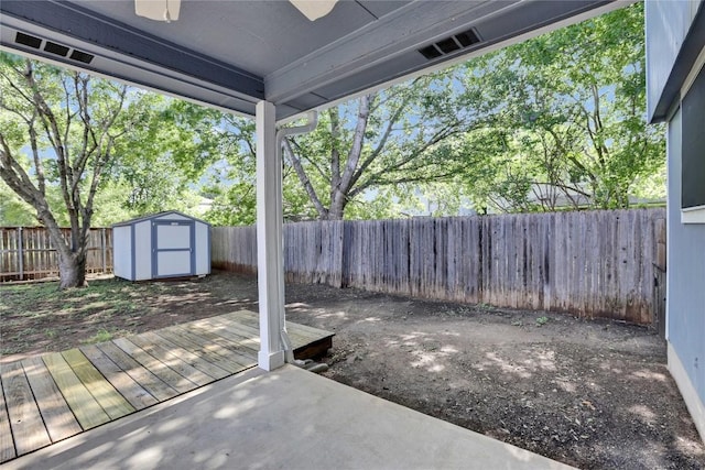 1608 Melibee Trl, Austin, TX 78748 - fenced backyard featuring a storage unit and a deck