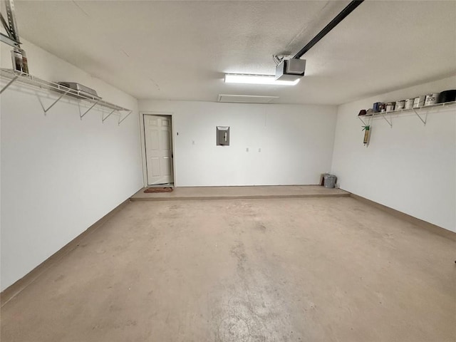 1907 Rutherford Dr, Leander, TX 78641 - garage with a garage door opener and electric panel