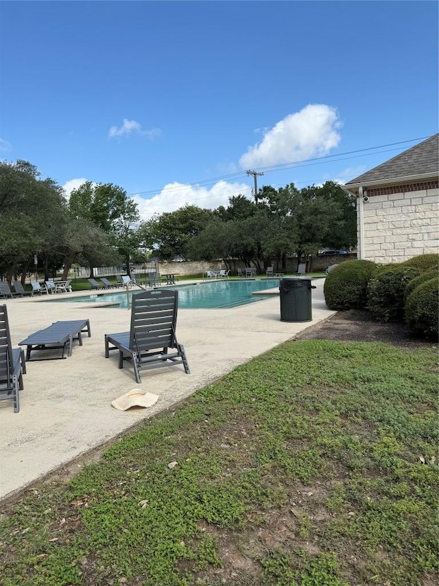 1907 Rutherford Dr, Leander, TX 78641 - community pool with a patio area